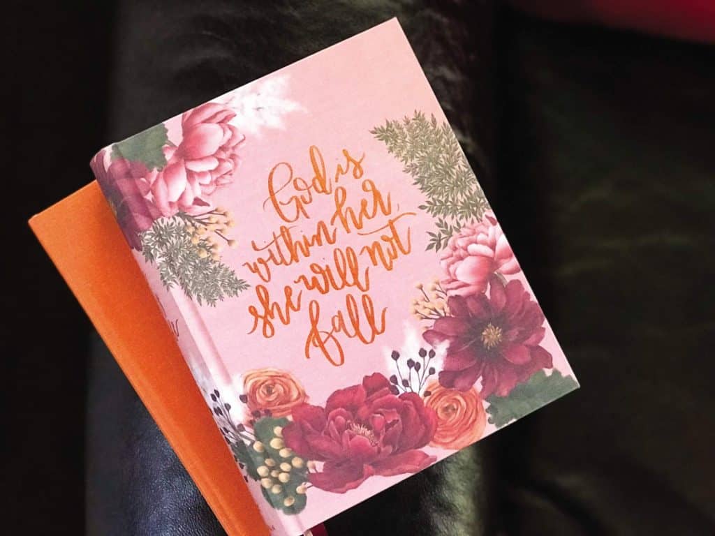 red and pink flower Bible 