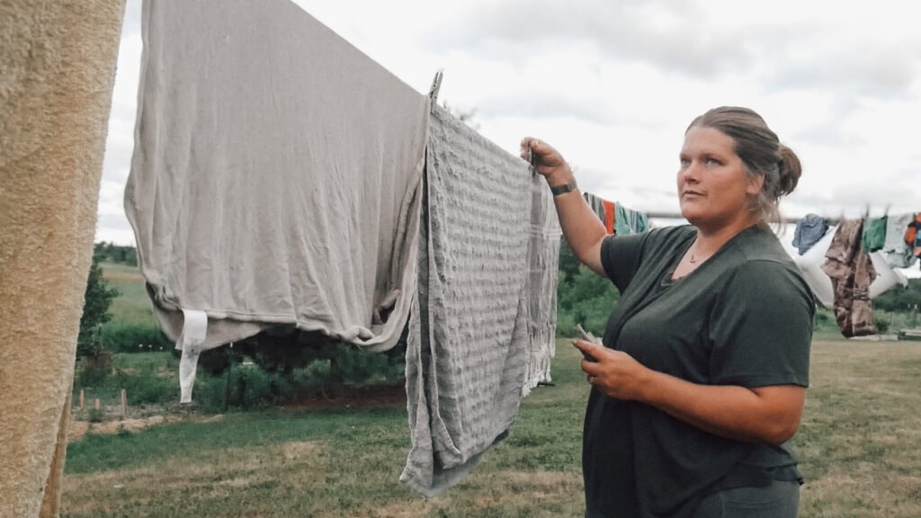 Cease Striving and Know that I Am God - Mom hanging laundry